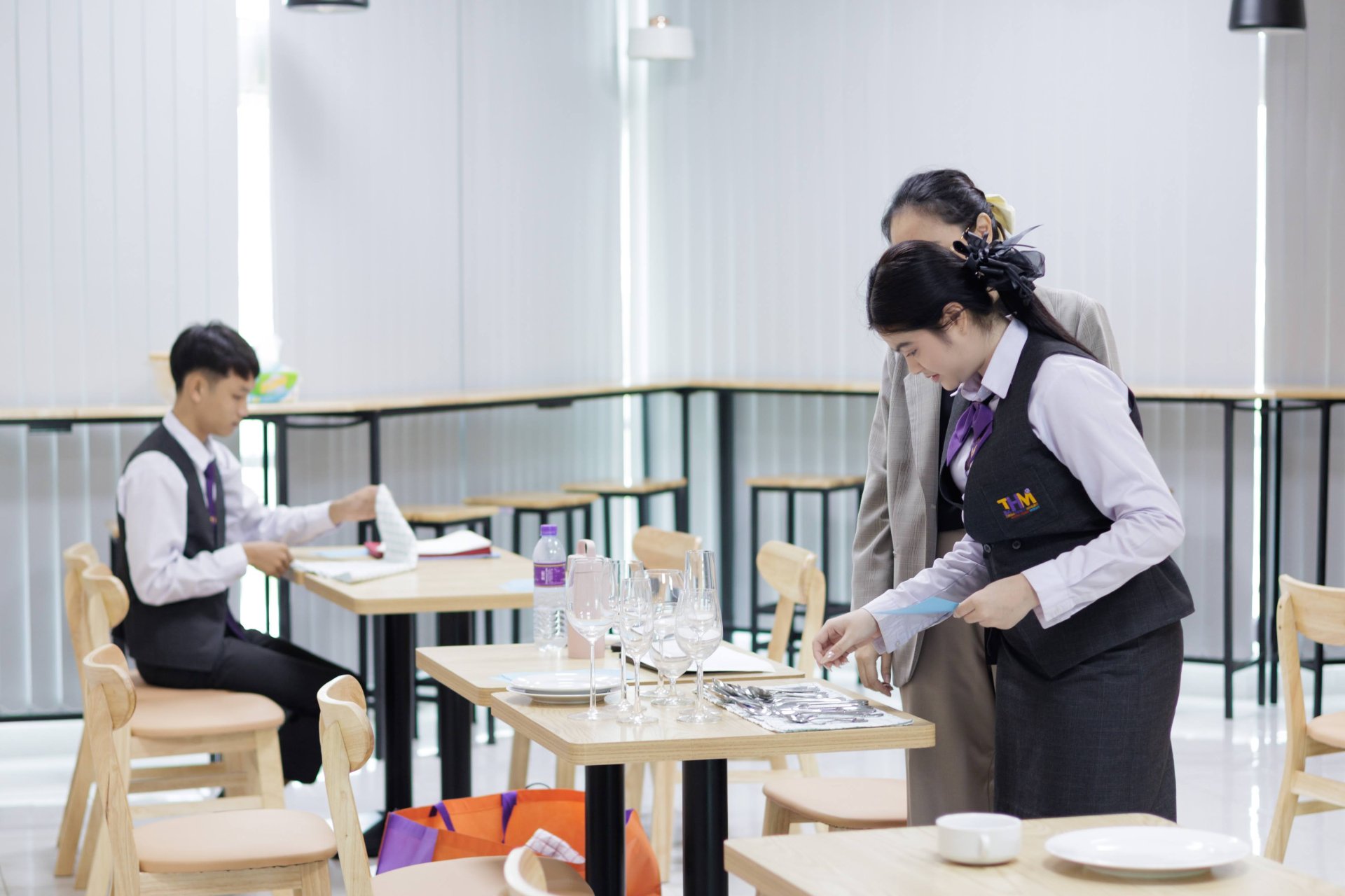 Learning by Doing: IST Students Build Professional Food and Beverage Service Skills through Table Setting and Napkin Folding